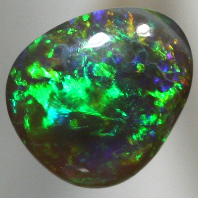 SOLID BLACK OPAL Pretty! Sparkling and bright gemmy green fire. SEE VIDEO